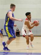 9 October 2021; Kris Arcilla of Griffith College Templeogue in action against James Harding of DCU St Vincent's during the InsureMyVan.ie Men's Super League North Conference match between DCU St Vincent's and Griffith College Templeogue at DCU Sports Complex in Dublin. Photo by Daniel Tutty/Sportsfile