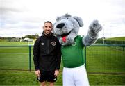 10 October 2021; Macúl the official FAI mascot for all supporters in partnership with the Confederation of Republic of Ireland Supporters Clubs at a Republic of Ireland training session in Abbotstown, Dublin, with Conor Hourihane. Photo by Stephen McCarthy/Sportsfile