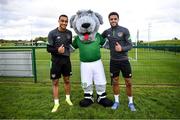 10 October 2021; Macúl the official FAI mascot for all supporters in partnership with the Confederation of Republic of Ireland Supporters Clubs at a Republic of Ireland training session in Abbotstown, Dublin, with Adam Idah, left, and Andrew Omobamidele. Photo by Stephen McCarthy/Sportsfile