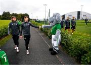 10 October 2021; Macúl the official FAI mascot for all supporters in partnership with the Confederation of Republic of Ireland Supporters Clubs at a Republic of Ireland training session in Abbotstown, Dublin, with James Collins, centre, and Jeff Hendrick. Photo by Stephen McCarthy/Sportsfile