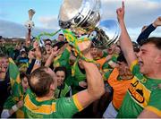 10 October 2021; Dunloy captain Paul Shiels lifts the cup following his side's victory in the Antrim County Senior Club Hurling Championship Final match between Dunloy and O'Donovan Rossa at Corrigan Park in Belfast. Photo by Ramsey Cardy/Sportsfile