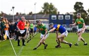 10 October 2021; Ryan McGarry of Dunloy in action against Gerard Walsh of O'Donovan Rossa during the Antrim County Senior Club Hurling Championship Final match between Dunloy and O'Donovan Rossa at Corrigan Park in Belfast. Photo by Ramsey Cardy/Sportsfile