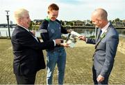 11 October 2021; Sportsfile photographer Ray McManus, left, Limerick hurler William O'Donoghue and Cllr Daniel Butler, Mayor of the City and County of Limerick, right, look at a photo of O'Donoghue at the launch of 'Back 2 Back' at Limerick City and County Council offices at Merchants Quay in Limerick. Photo by Diarmuid Greene/Sportsfile