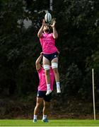 11 October 2021; Caelan Doris is lifted by Rónan Kelleher during a Leinster Rugby squad training session at UCD in Dublin. Photo by Harry Murphy/Sportsfile