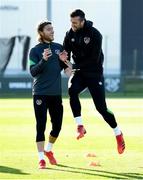 11 October 2021; Shane Duffy celebrates a score with Jeff Hendrick, left, during a Republic of Ireland training session at the FAI National Training Centre in Abbotstown, Dublin. Photo by Stephen McCarthy/Sportsfile