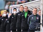 8 October 2021; Republic of Ireland Assistant manager John O'Shea, second from right, Republic of Ireland manager Jim Crawford, right, and members of the backroom staff stand for Amhrán na bhFiann before the UEFA European U21 Championship Qualifier match between Republic of Ireland and Luxembourg at Tallaght Stadium in Dublin. Photo by Sam Barnes/Sportsfile