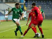 12 October 2021; William Ferry of Republic of Ireland in action against Omar Sarif Sijaric, 10, and Andrija Ražnatovic of Montenegro during the UEFA European U21 Championship Qualifier Group F match between Montenegro and Republic of Ireland at Gradski Stadion Podgorica in Podgorica, Montenegro. Photo by Filip Roganovic/Sportsfile