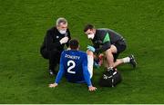 12 October 2021; Matt Doherty of Republic of Ireland is given medical attention by Republic of Ireland team doctor Dr Alan Byrne, left, and chartered physiotherapist Kevin Mulholland during the international friendly match between Republic of Ireland and Qatar at Aviva Stadium in Dublin. Photo by Seb Daly/Sportsfile