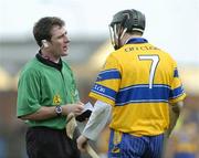 21 March 2004; Referee Declan Roche speaks to Clare's Gerry Quinn. Allianz Hurling League 2004, Division 1A, Round 4, Clare v Kilkenny, Cusack Park, Ennis, Co. Clare. Picture credit; Ray McManus / SPORTSFILE *EDI*