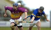 14 March 2004; Barry Lambert, Wexford, in action against Michael Phelan, Tipperary. Allianz Hurling League 2004, Division 1B, Round 3, Wexford v Tipperary, Wexford Park, Wexford. Picture credit; Pat Murphy / SPORTSFILE *EDI*