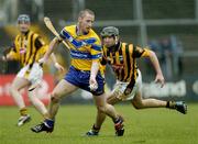 21 March 2004; David Hoey, Clare, in action against Eddie Brennan, Kilkenny. Allianz Hurling League 2004, Division 1A, Round 4, Clare v Kilkenny, Cusack Park, Ennis, Co. Clare. Picture credit; Ray McManus / SPORTSFILE *EDI*