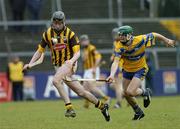 21 March 2004; Martin Comerford, Kilkenny, in action against Brian O'Connell, Clare. Allianz Hurling League 2004, Division 1A, Round 4, Clare v Kilkenny, Cusack Park, Ennis, Co. Clare. Picture credit; Ray McManus / SPORTSFILE *EDI*