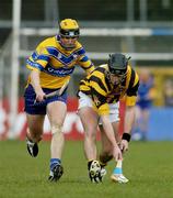 21 March 2004; JJ Delaney, Kilkenny, in action against Tony Griffin, Clare. Allianz Hurling League 2004, Division 1A, Round 4, Clare v Kilkenny, Cusack Park, Ennis, Co. Clare. Picture credit; Ray McManus / SPORTSFILE *EDI*
