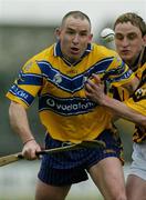 21 March 2004; Colin Lynch, Clare, in action against Mark Phelan, Kilkenny. Allianz Hurling League 2004, Division 1A, Round 4, Clare v Kilkenny, Cusack Park, Ennis, Co. Clare. Picture credit; Ray McManus / SPORTSFILE *EDI*
