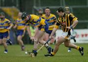 21 March 2004; Niall Gilligan, Clare, in action against Michael Kavanagh, Kilkenny. Allianz Hurling League 2004, Division 1A, Round 4, Clare v Kilkenny, Cusack Park, Ennis, Co. Clare. Picture credit; Ray McManus / SPORTSFILE *EDI*