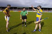 21 March 2004; Sean McMahon, Clare, indicates his preference after winning the toss. Also included is referee Seamus Roche and Martin Comerford, Kilkenny. Allianz Hurling League 2004, Division 1A, Round 4, Clare v Kilkenny, Cusack Park, Ennis, Co. Clare. Picture credit; Ray McManus / SPORTSFILE *EDI*