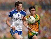 21 July 2013; Darren Hughes, Monaghan, in action against Ryan McHugh, Donegal. Ulster GAA Football Senior Championship Final, Donegal v Monaghan, St Tiernach's Park, Clones, Co. Monaghan. Picture credit: Oliver McVeigh / SPORTSFILE