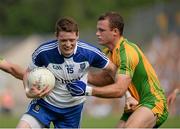 21 July 2013; Conor McManus, Monaghan, in action against Neil McGee, Donegal. Ulster GAA Football Senior Championship Final, Donegal v Monaghan, St Tiernach's Park, Clones, Co. Monaghan. Picture credit: Oliver McVeigh / SPORTSFILE