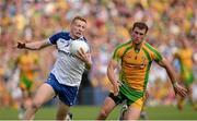 21 July 2013; Kieran Hughes, Monaghan, in action against Eamon McGee, Donegal. Ulster GAA Football Senior Championship Final, Donegal v Monaghan, St Tiernach's Park, Clones, Co. Monaghan. Picture credit: Oliver McVeigh / SPORTSFILE