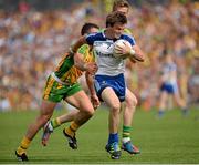 21 July 2013; Dessie Mone, Monaghan, in action against Paddy McGrath, Donegal. Ulster GAA Football Senior Championship Final, Donegal v Monaghan, St Tiernach's Park, Clones, Co. Monaghan. Picture credit: Oliver McVeigh / SPORTSFILE