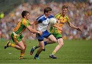 21 July 2013; Dessie Mone, Monaghan, in action against Paddy McGrath and Ross Wherity, Donegal. Ulster GAA Football Senior Championship Final, Donegal v Monaghan, St Tiernach's Park, Clones, Co. Monaghan. Picture credit: Oliver McVeigh / SPORTSFILE