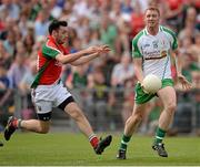 21 July 2013; Cathal Magee, London, in action against Kevin McLoughlin, Mayo. Connacht GAA Football Senior Championship Final, Mayo v London, Elverys MacHale Park, Castlebar, Co. Mayo. Picture credit: Stephen McCarthy / SPORTSFILE
