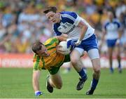 21 July 2013; Conor McManus, Monaghan, in action against Neil McGee, Donegal. Ulster GAA Football Senior Championship Final, Donegal v Monaghan, St Tiernach's Park, Clones, Co. Monaghan. Picture credit: Brian Lawless / SPORTSFILE