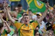 21 July 2013; A Donegal supporter celebrates a point. Ulster GAA Football Senior Championship Final, Donegal v Monaghan, St Tiernach's Park, Clones, Co. Monaghan. Picture credit: Brian Lawless / SPORTSFILE