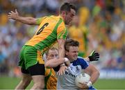 21 July 2013; Dessie Mone, Monaghan, in action against Karl Lacey, left, and Anthony Thompson, Donegal. Ulster GAA Football Senior Championship Final, Donegal v Monaghan, St Tiernach's Park, Clones, Co. Monaghan. Picture credit: Brian Lawless / SPORTSFILE