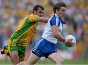 21 July 2013; Dessie Mone, Monaghan, in action against Frank McGlynn, Donegal. Ulster GAA Football Senior Championship Final, Donegal v Monaghan, St Tiernach's Park, Clones, Co. Monaghan. Picture credit: Brian Lawless / SPORTSFILE