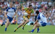 21 July 2013; Rory Kavanagh, Donegal, in action against Neil McAdam and Martin McElroy, left, Monaghan. Ulster GAA Football Senior Championship Final, Donegal v Monaghan, St Tiernach's Park, Clones, Co. Monaghan. Picture credit: Brian Lawless / SPORTSFILE