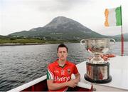 23 July 2013; Mayo footballer Cillian O'Connor is photographed on the Grainne Rose boat on Dunlewy Lake at the official launch of the 2013 GAA Football Championship All-Ireland Series. Dunlewy, Co. Donegal. Picture credit: Ray McManus / SPORTSFILE