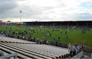 23 July 2013; A general view of the large crowd crossing the pitch to the stand before the game. Electric Ireland Munster GAA Hurling Minor Championship Final Replay, Limerick v Waterford, Semple Stadium, Thurles, Co. Tipperary. Picture credit: Barry Cregg / SPORTSFILE