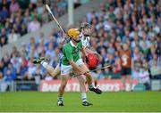 23 July 2013; Tom Morrissey, Limerick, in action against Shane Bennett, Waterford. Electric Ireland Munster GAA Hurling Minor Championship Final Replay, Limerick v Waterford, Semple Stadium, Thurles, Co. Tipperary. Picture credit: Barry Cregg / SPORTSFILE