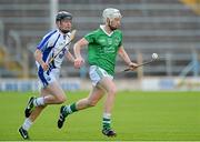 23 July 2013; Cian Lynch, Limerick, in action against Shane Bennett, Waterford. Electric Ireland Munster GAA Hurling Minor Championship Final Replay, Limerick v Waterford, Semple Stadium, Thurles, Co. Tipperary. Picture credit: Barry Cregg / SPORTSFILE