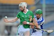 23 July 2013; Cian Lynch, Limerick, in action against William Hahessy, Waterford. Electric Ireland Munster GAA Hurling Minor Championship Final Replay, Limerick v Waterford, Semple Stadium, Thurles, Co. Tipperary. Picture credit: Barry Cregg / SPORTSFILE