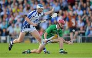 23 July 2013; Barry Nash, Limerick, in action against Tom Devine, Waterford. Electric Ireland Munster GAA Hurling Minor Championship Final Replay, Limerick v Waterford, Semple Stadium, Thurles, Co. Tipperary. Picture credit: Barry Cregg / SPORTSFILE