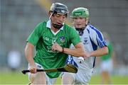 23 July 2013; Pat Ryan, Limerick, in action against Cian Leamy, Waterford. Electric Ireland Munster GAA Hurling Minor Championship Final Replay, Limerick v Waterford, Semple Stadium, Thurles, Co. Tipperary. Picture credit: Barry Cregg / SPORTSFILE
