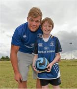 24 July 2013; Leinster's Jordi Murphy with Diarmuid Burrows, from Tullow, Co. Carlow, during a Leinster Rugby Summer Camp at Tullow RFC. Tullow RFC, Tullow, Co. Carlow. Picture credit: Matt Browne / SPORTSFILE