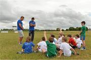 24 July 2013; Leinster's Jordi Murphy and Mike McCarthy, right, with children at the Leinster Rugby Summer Camp at Tullow RFC. Tullow RFC, Tullow, Co. Carlow. Picture credit: Matt Browne / SPORTSFILE