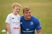 24 July 2013; Leinster's Jordi Murphy with seven year old James Hayden, from Bagenalstown, Co. Carlow, during a Leinster Rugby Summer Camp at Tullow RFC. Tullow RFC, Tullow, Co. Carlow. Picture credit: Matt Browne / SPORTSFILE