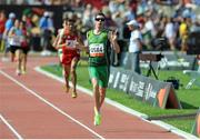 24 July 2013; Team Ireland’s Michael McKillop, from Newtownabbey, Co. Antrim, celebrates on his approach to the finish line on his way to winning the Men’s 1500 – T38 final, in a championship record time of 4:10.17. 2013 IPC Athletics World Championships, Stadium Parilly, Lyon, France. Picture credit: John Paul Thomas / SPORTSFILE