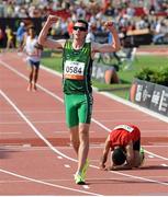 24 July 2013; Team Ireland’s Michael McKillop, from Newtownabbey, Co. Antrim, celebrates after crossing the finish line to win the Men’s 1500 – T38 final, in a championship record time of 4:10.17. 2013 IPC Athletics World Championships, Stadium Parilly, Lyon, France. Picture credit: John Paul Thomas / SPORTSFILE