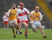 24 July 2013; Ciaran Lynch, Derry, in action against David Kearney, left, and Chris McGuinness, Antrim. Bord Gáis Energy Ulster GAA Hurling Under 21 Championship Final, Antrim v Derry, Casement Park, Belfast, Co. Antrim. Picture credit: Oliver McVeigh / SPORTSFILE