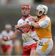 24 July 2013; Ciaran Lynch, Derry, in action against Tiernan Coyle, Antrim. Bord Gáis Energy Ulster GAA Hurling Under 21 Championship Final, Antrim v Derry, Casement Park, Belfast, Co. Antrim. Picture credit: Oliver McVeigh / SPORTSFILE