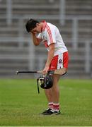 24 July 2013; A disappointed Caolan McGurk, Derry, after the final whistle. Bord Gáis Energy Ulster GAA Hurling Under 21 Championship Final, Antrim v Derry, Casement Park, Belfast, Co. Antrim. Picture credit: Oliver McVeigh / SPORTSFILE