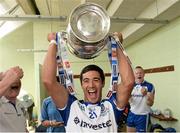 21 July 2013; Conor Galligan, Monaghan, celebrates with the cup in the dressing room after the game. Ulster GAA Football Senior Championship Final, Donegal v Monaghan, St Tiernach's Park, Clones, Co. Monaghan. Picture credit: Oliver McVeigh / SPORTSFILE