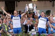 21 July 2013; Owen Lennon, left, and Conor McManus, Monaghan, lift the Anglo Celt cup after the game. Ulster GAA Football Senior Championship Final, Donegal v Monaghan, St Tiernach's Park, Clones, Co. Monaghan. Picture credit: Oliver McVeigh / SPORTSFILE