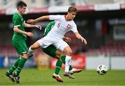 13 October 2021; Tomasso Guercio of Poland is tackled by Darius Lipsiuc of Republic of Ireland during the UEFA U17 Championship Qualifying Round Group 5 match between Republic of Ireland and Poland at Turner's Cross in Cork. Photo by Eóin Noonan/Sportsfile