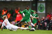 13 October 2021; Franco Umeh of Republic of Ireland is tackled by Jakub Staniszewski and Marcel Kalemba of Poland during the UEFA U17 Championship Qualifying Round Group 5 match between Republic of Ireland and Poland at Turner's Cross in Cork. Photo by Eóin Noonan/Sportsfile